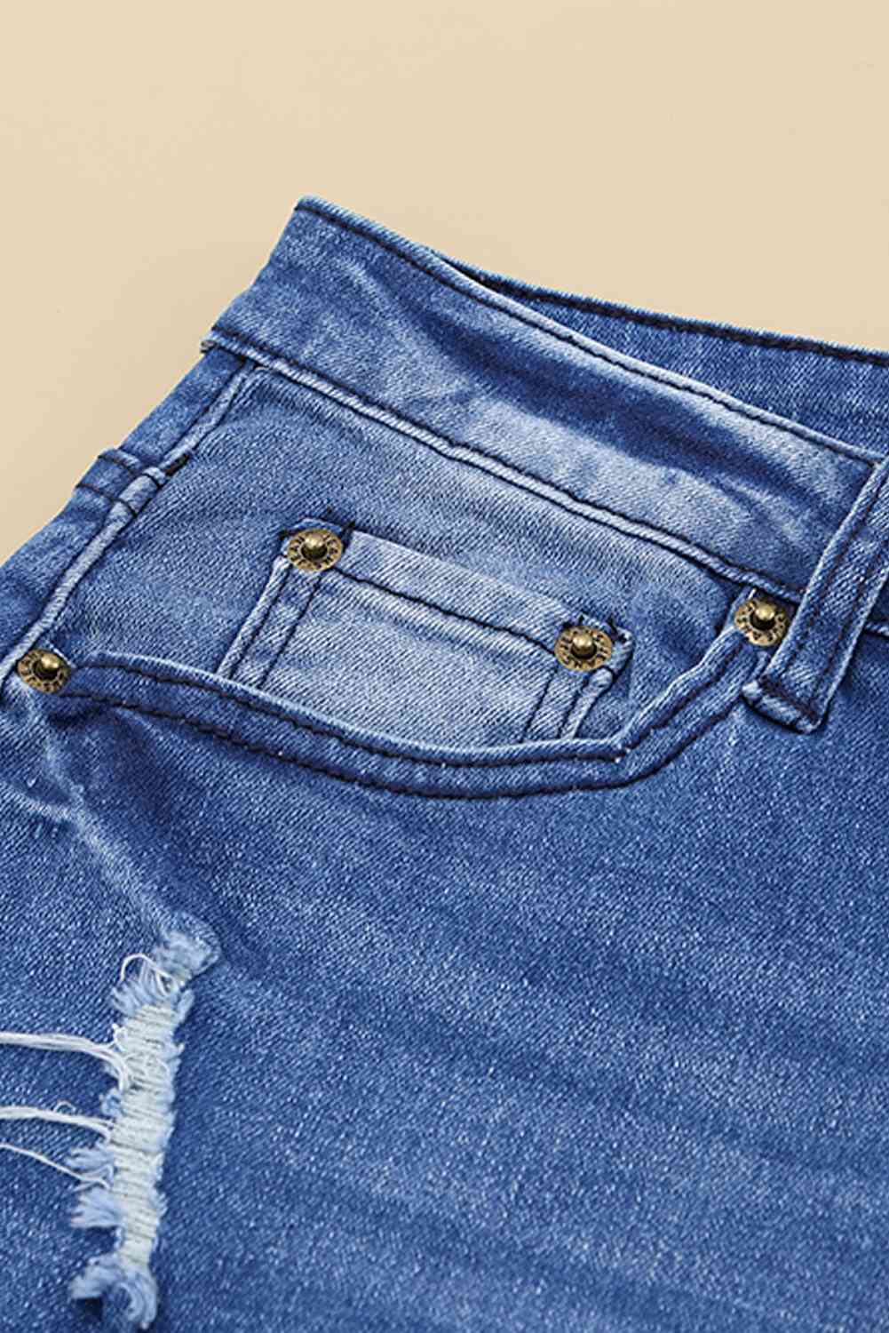 Stilla | Distressed Flare Leg Jeans Med Lommer