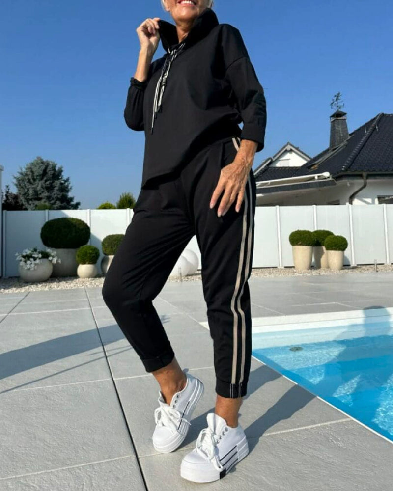 Stilla | To-delt sæt med dame hætte sweatshirt og bukser