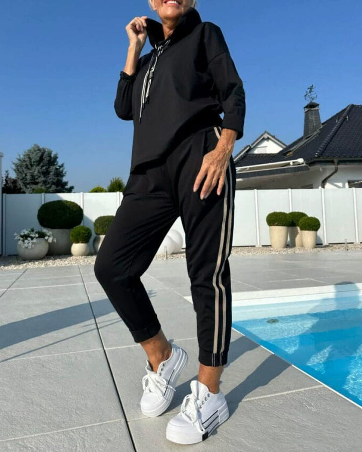 Stilla | To-delt sæt med dame hætte sweatshirt og bukser