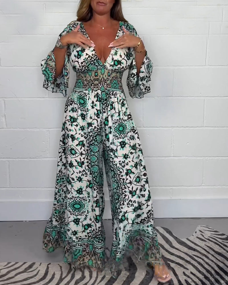 Stilla | Jumpsuit med Print og Dyb V-Udskæring