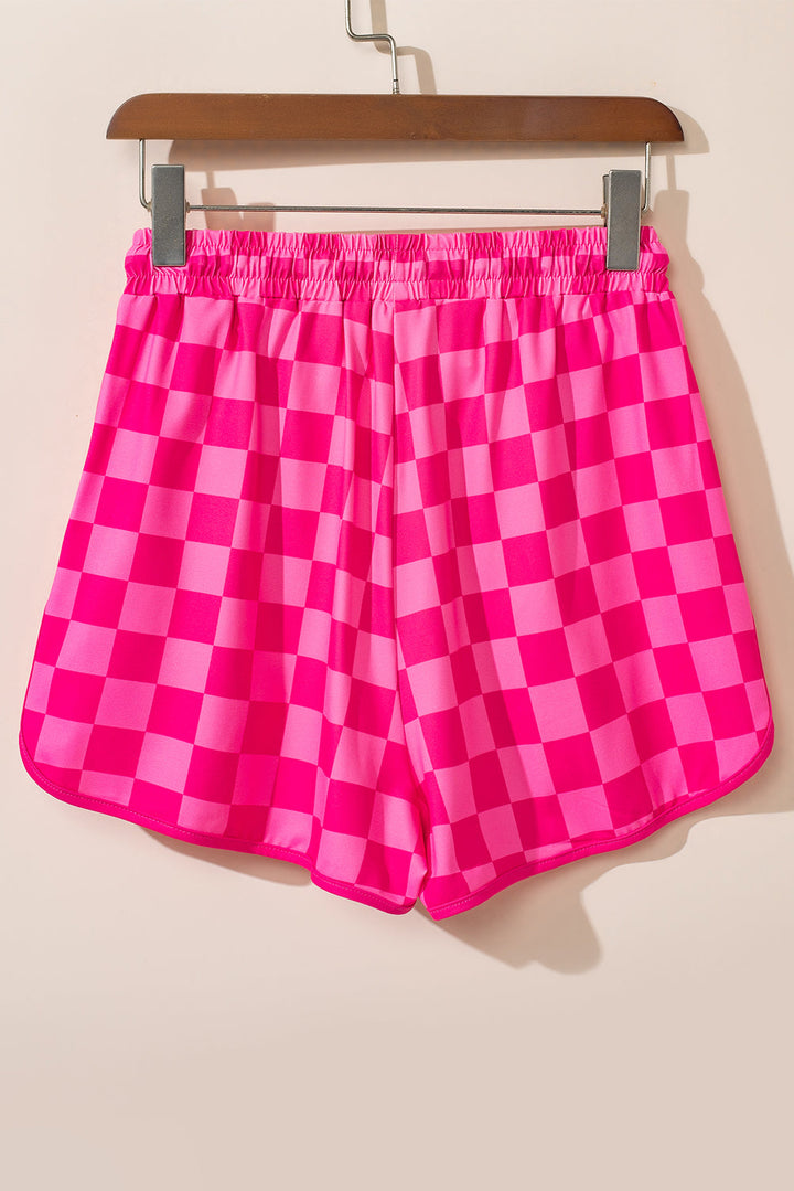 Stilla | Rutede shorts med lommer