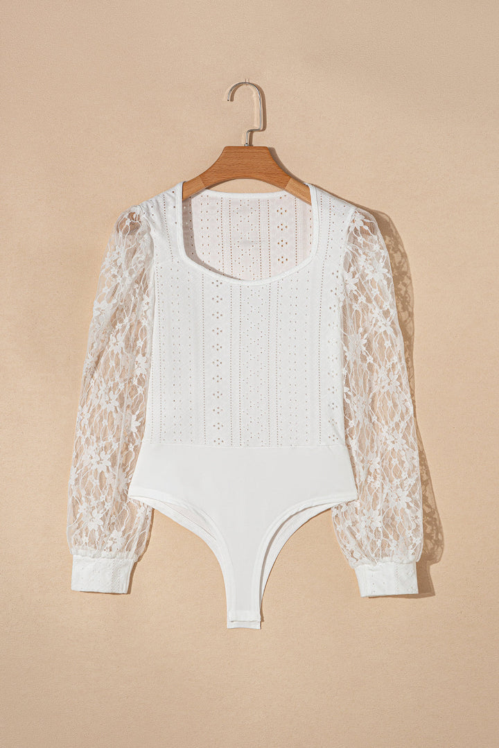 Stilla | Spids-langærmet-bodysuit