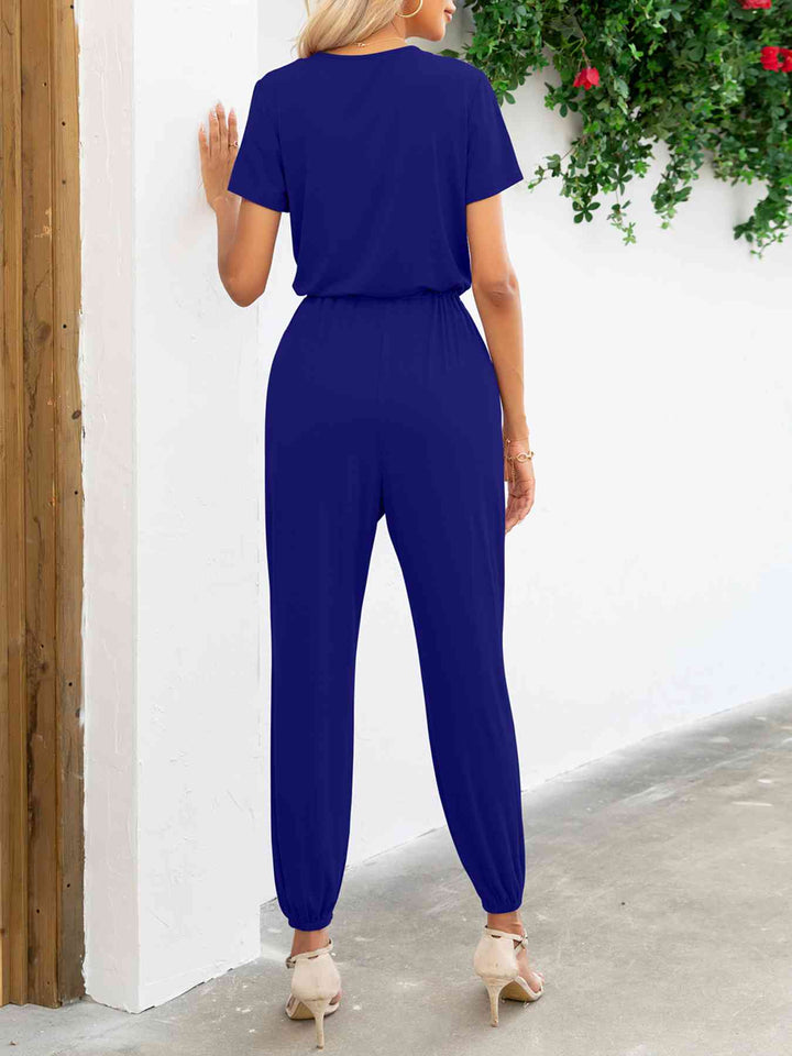 Stilla | Ærme V-hals Jumpsuit Med Lommer