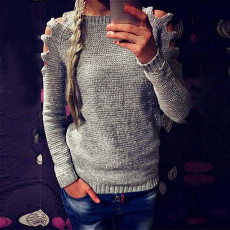 Dame strikket sweater med åbent skulderdesign og glitrende accenter Stilla