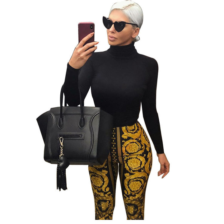 Dame to-delte sæt med fashionabelt crop-top og høj talje leggings i det pompøse barokdesign Stilla