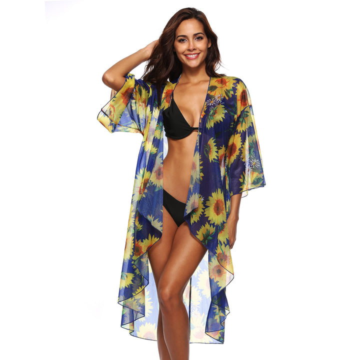 Dame transparent strandkimono med florale accenter og elegant snit Stilla