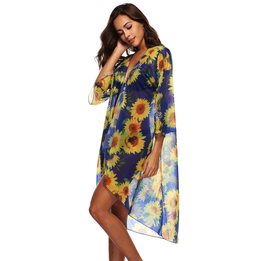 Dame transparent strandkimono med florale accenter og elegant snit Stilla