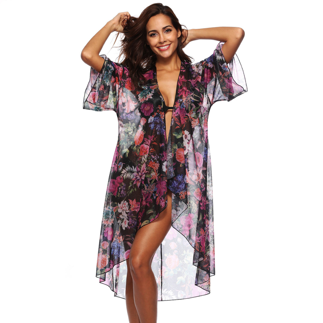 Dame elegant strandtunika i floral design med asymmetrisk snit Stilla