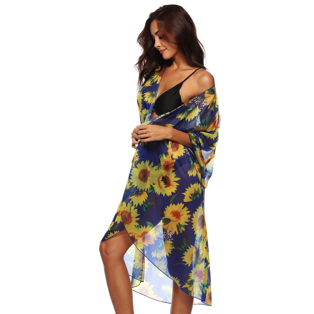 Dame transparent strandkimono med florale accenter og elegant snit Stilla