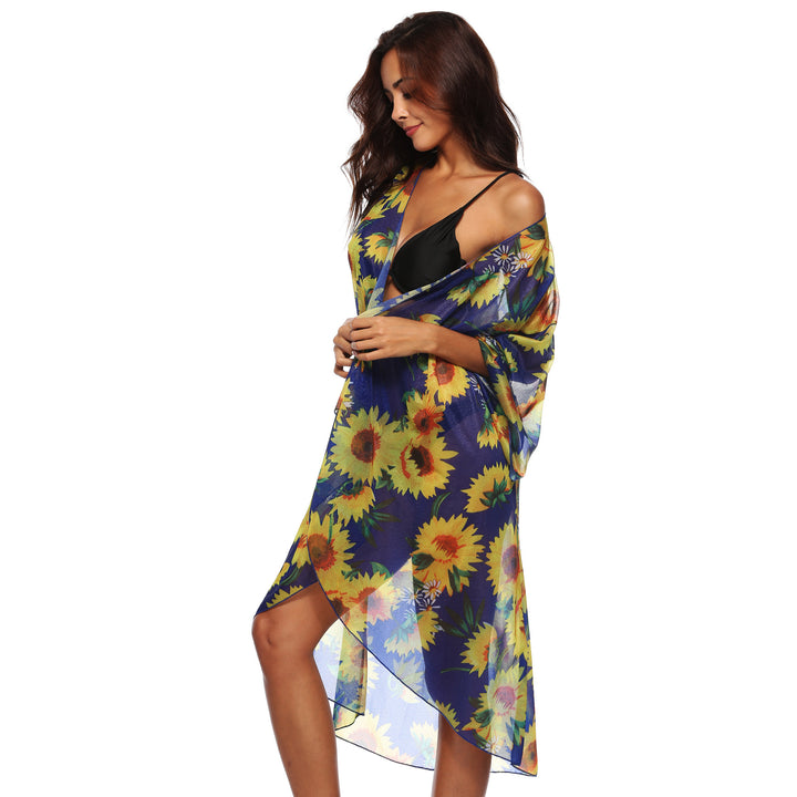 Dame transparent strandkimono med florale accenter og elegant snit Stilla