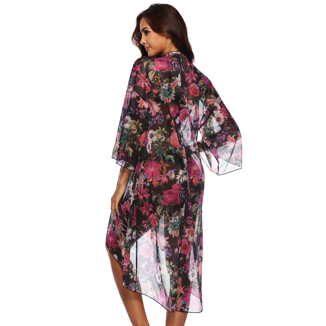 Dame elegant strandtunika i floral design med asymmetrisk snit Stilla