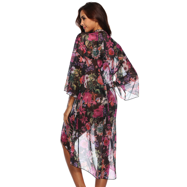 Dame elegant strandtunika i floral design med asymmetrisk snit Stilla