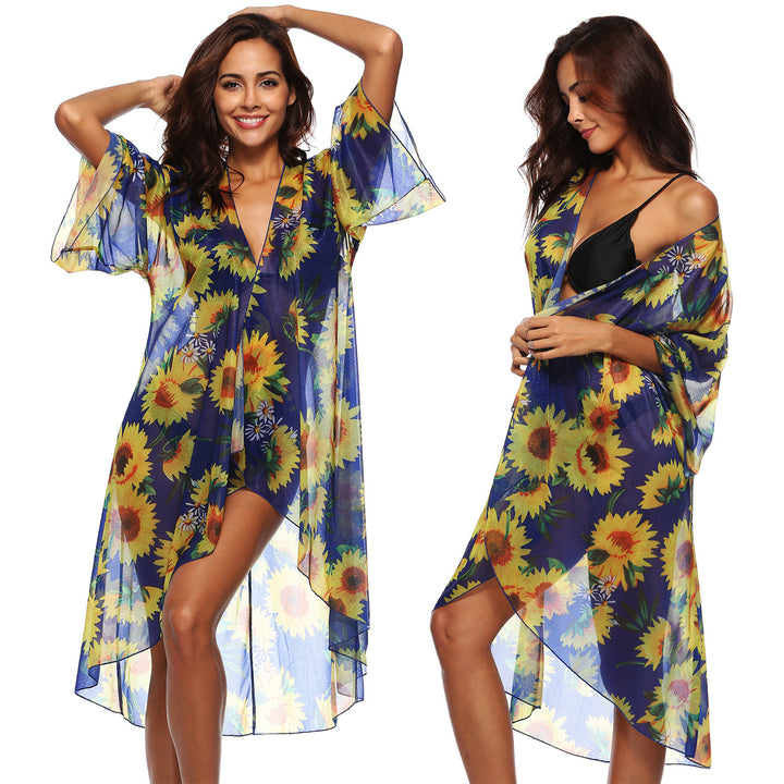 Dame transparent strandkimono med florale accenter og elegant snit Stilla