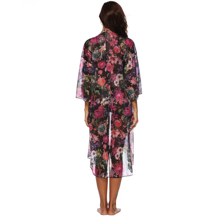 Dame elegant strandtunika i floral design med asymmetrisk snit Stilla