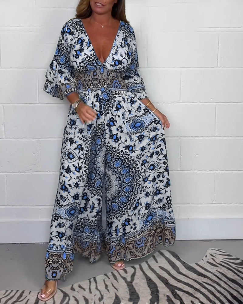 Stilla | Jumpsuit med Print og Dyb V-Udskæring