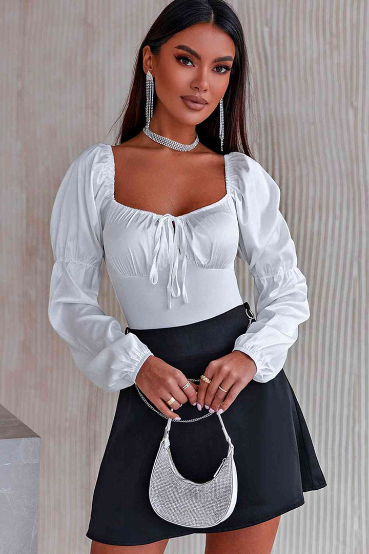 Stilla | Ærme Tied Bodysuit