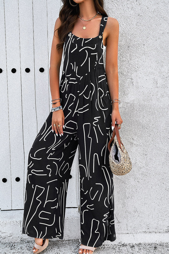 Stilla | Bred Strop Jumpsuit Med Lommer
