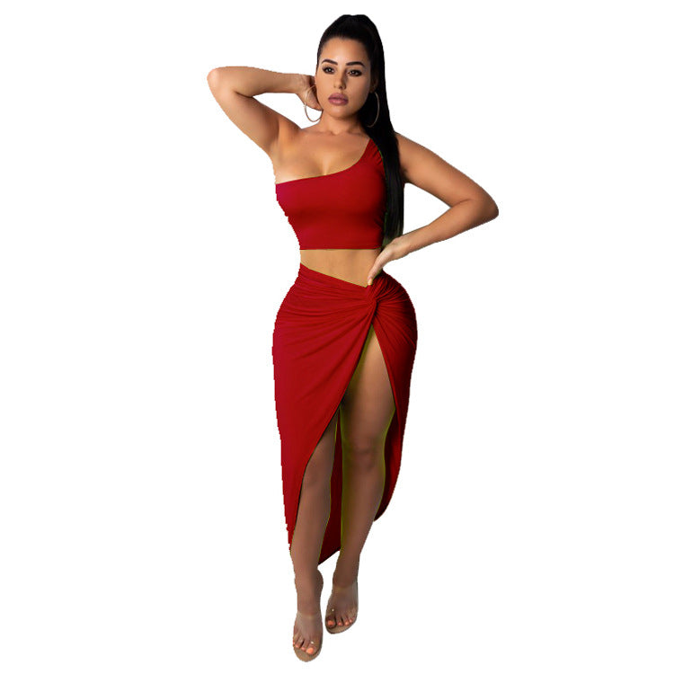 Dame sæt bestående af crop top og slynget nederdel med høj slids og knyttet design Stilla