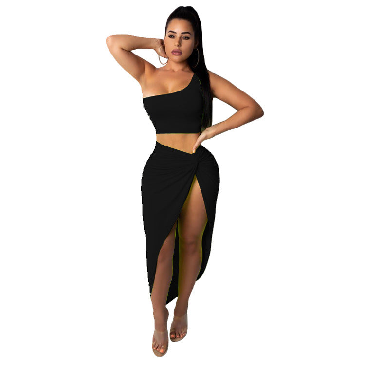 Dame sæt bestående af crop top og slynget nederdel med høj slids og knyttet design Stilla
