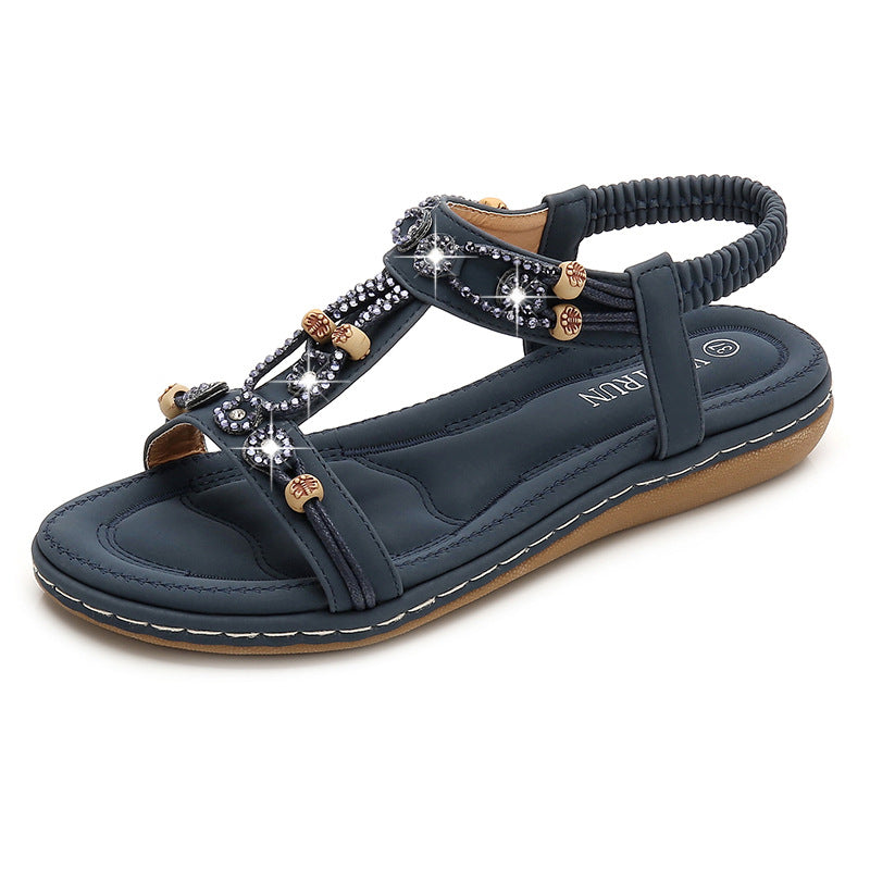Damessandaler med luksuriøse dekorationselementer Stilla