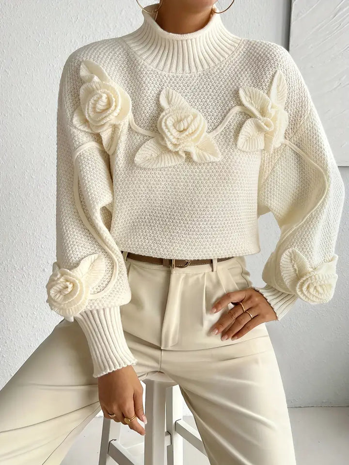 Stilla | Rullekrave strikbluse med blomster