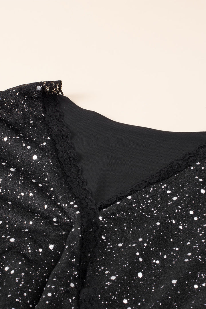 Stilla | Elegant sort glitrende kjole med mesh sene