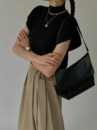 Stilla | Elegant strikvest med ståkrave og ærmer