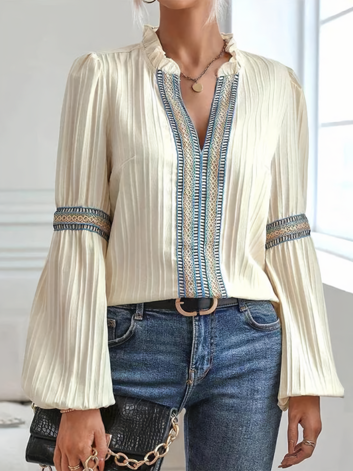 Stilla | Spidsbluse med raffinerede accenter