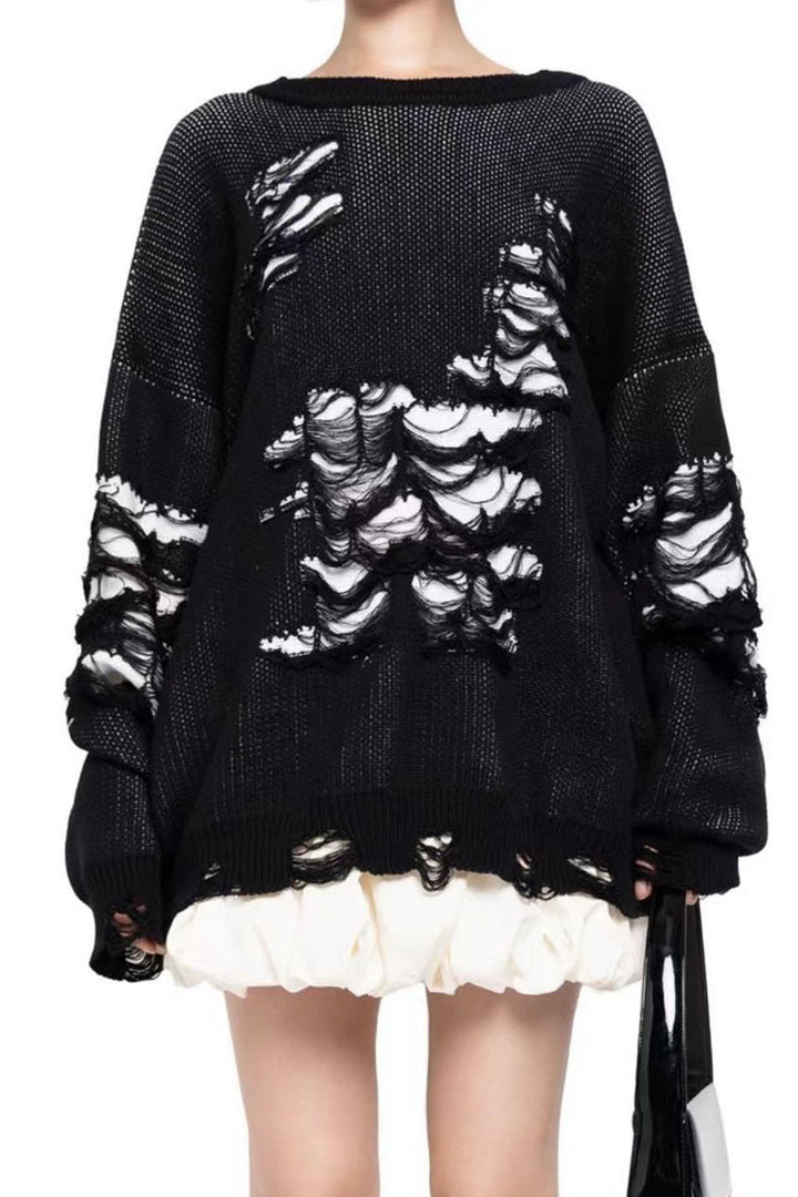 Stilla | Pullover med kontrasterende, slidt udseende