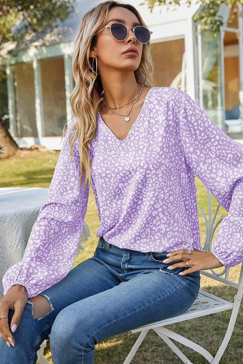 Stilla | Bluse med blomstret tryk og rynkede manschetter