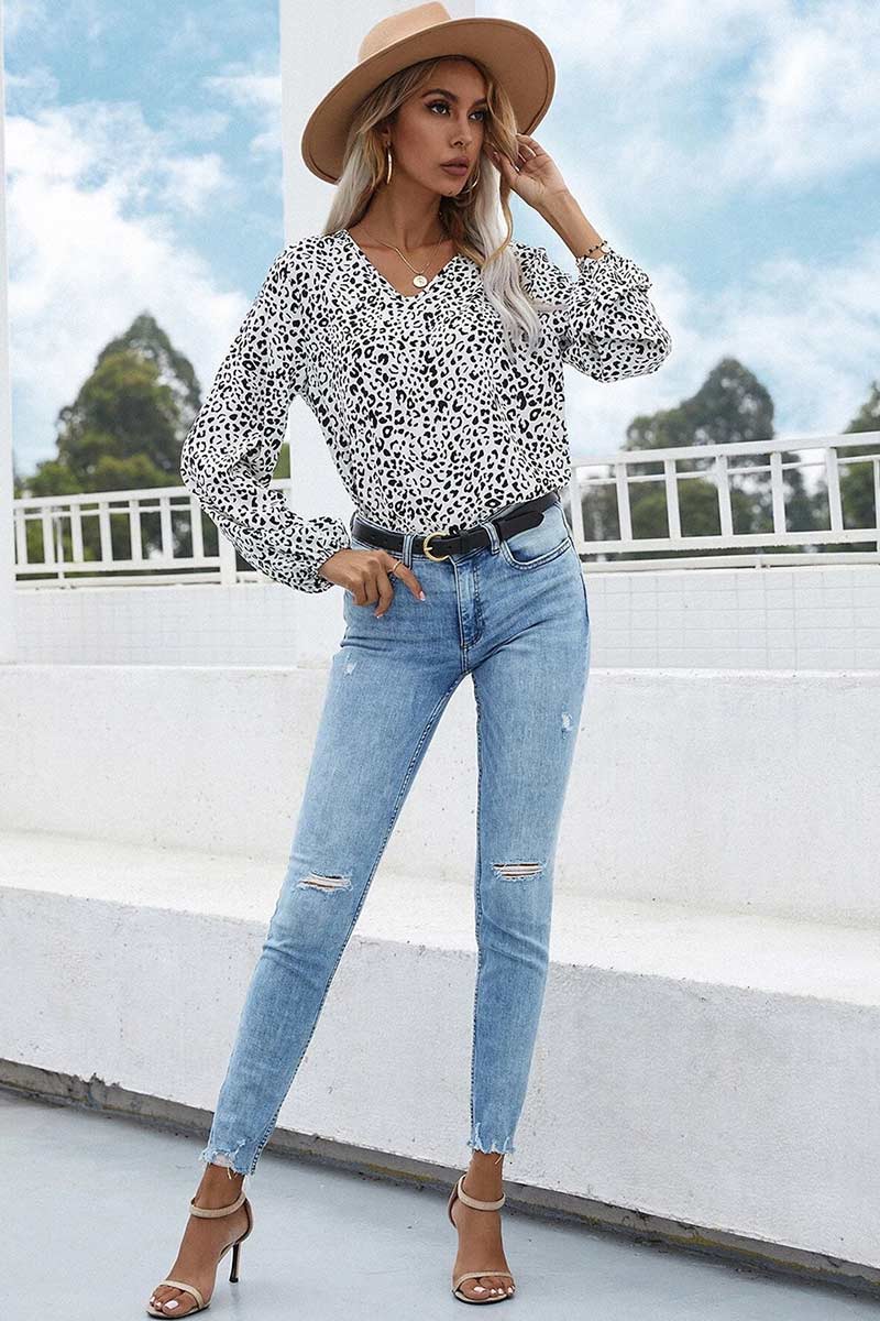 Stilla | Bluse med blomstret tryk og rynkede manschetter