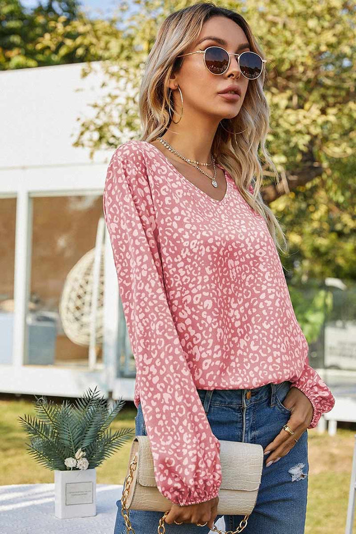 Stilla | Bluse med blomstret tryk og rynkede manschetter