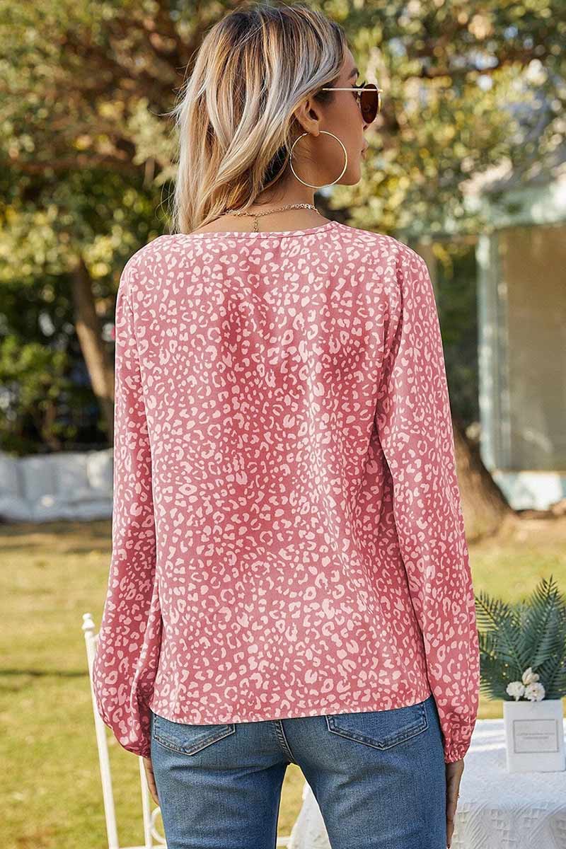 Stilla | Bluse med blomstret tryk og rynkede manschetter