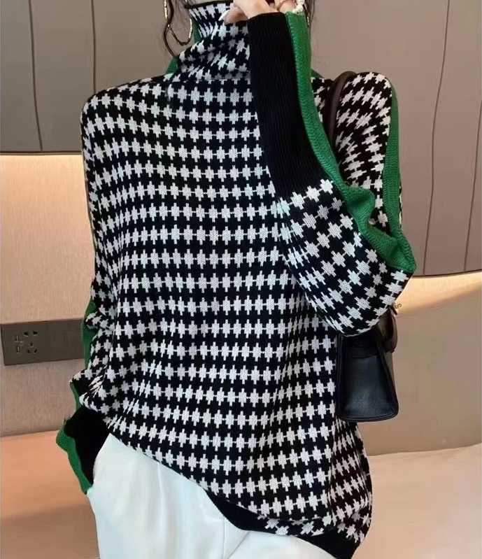 Stilla | Elegant sweater med sort-hvidt ternet mønster