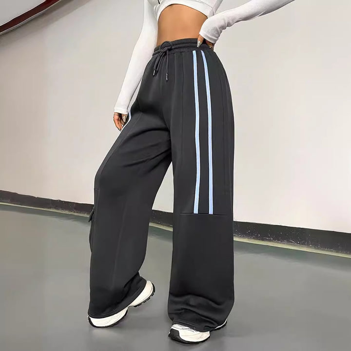 Kvinders løse sportbukser i urban streetwear-stil med elastisk talje og praktiske lommer Stilla