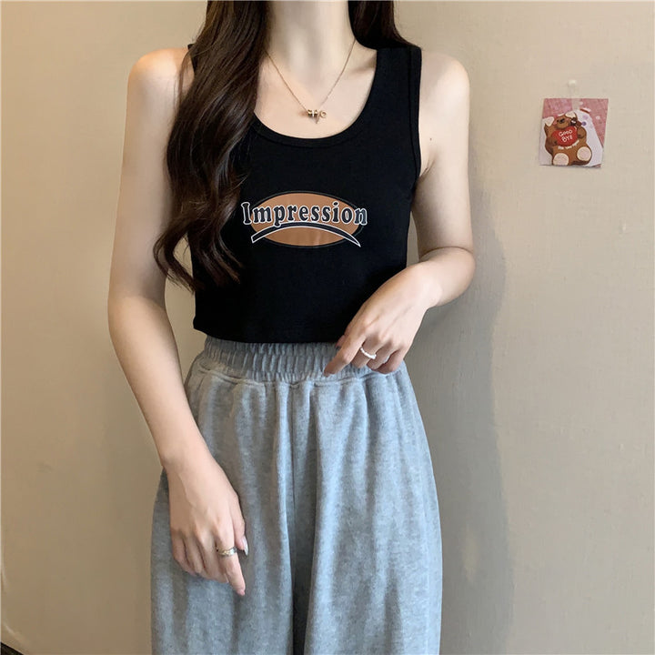 Femme Cropped Grafik Tanktop med legende print Stilla