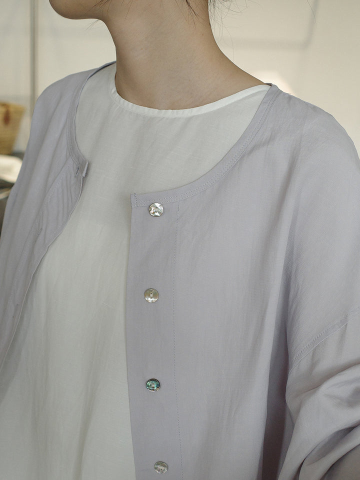 Dame luftig oversized top i fint struktureret materiale med indsnittede ærmer Stilla