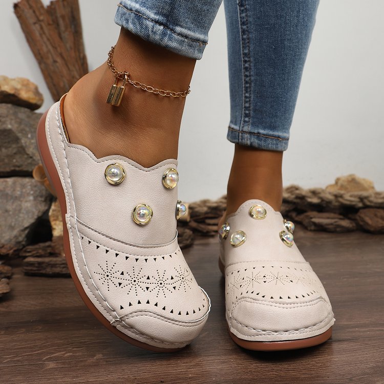 Dame Slip-On Clogs med Modeperforering og Elegante Dekordetaljer Stilla