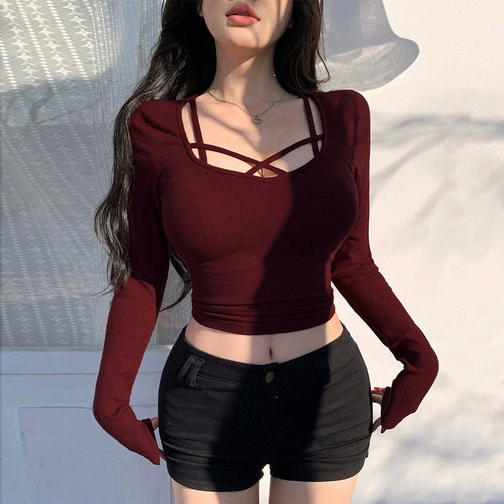 Kvinders langærmet cropped top med elegant snit og dekorative knuder Stilla