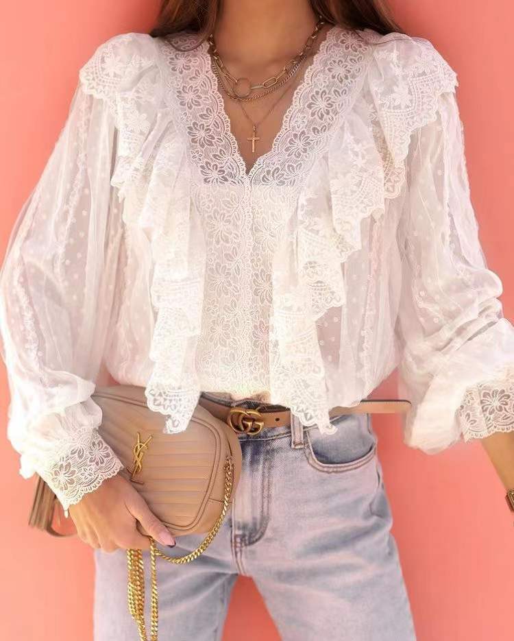Dame elegant bluse med spetskant og flæsedetaljer Stilla