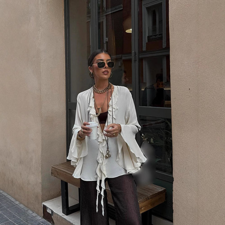 Dame Bluse med flæser og bred pasform samt elegante detaljer Stilla