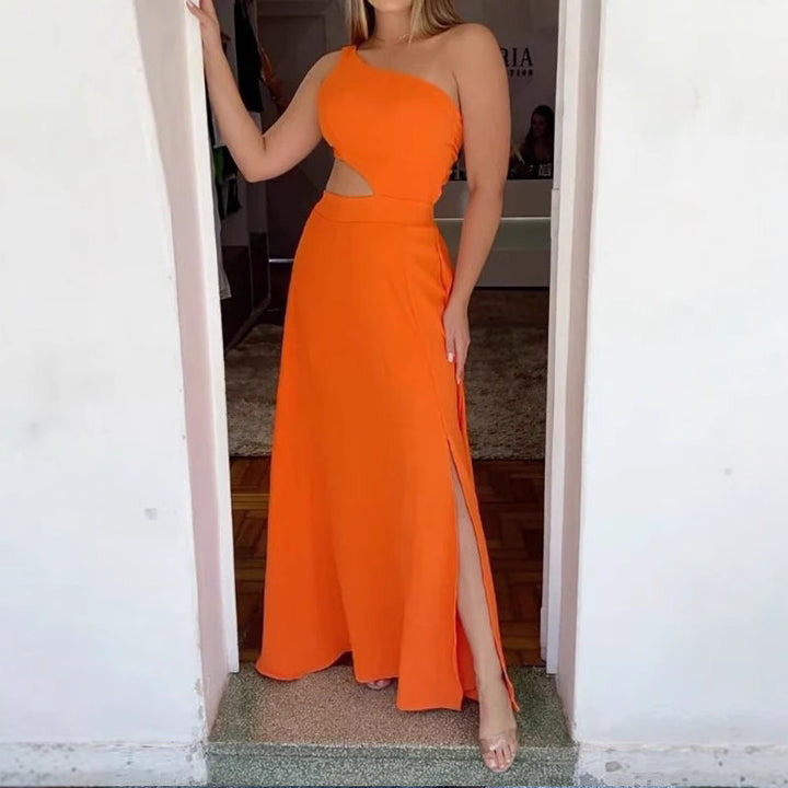 Dame Maxi-kjole med asymmetrisk udskæring og cut-out-detaljer Stilla