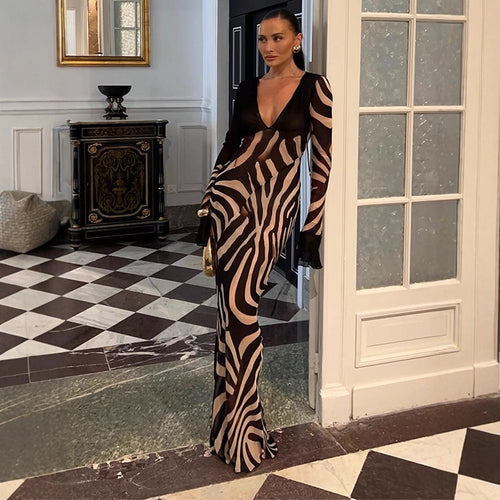 Dame maxikjole med asymmetrisk snit og elegant zebra-design Stilla