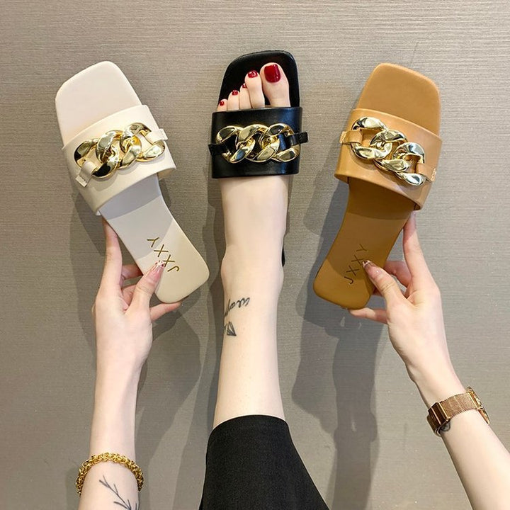 Dame Slide-sandaler med dekorativ kæde-design og komfortabelt fodbede Stilla