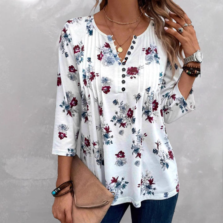 Kvinders bluse med blomsterprint og knapdetaljer Stilla