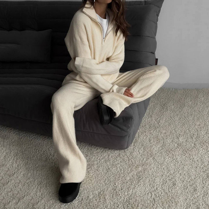 Kvinders komfortable strikket pullover med halv lynlås og ribbet design Skovae