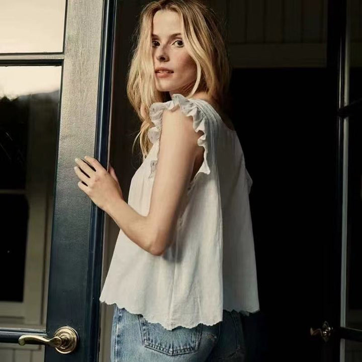 Damebluse med flæsedetaljer og elegant broderedesign Stilla