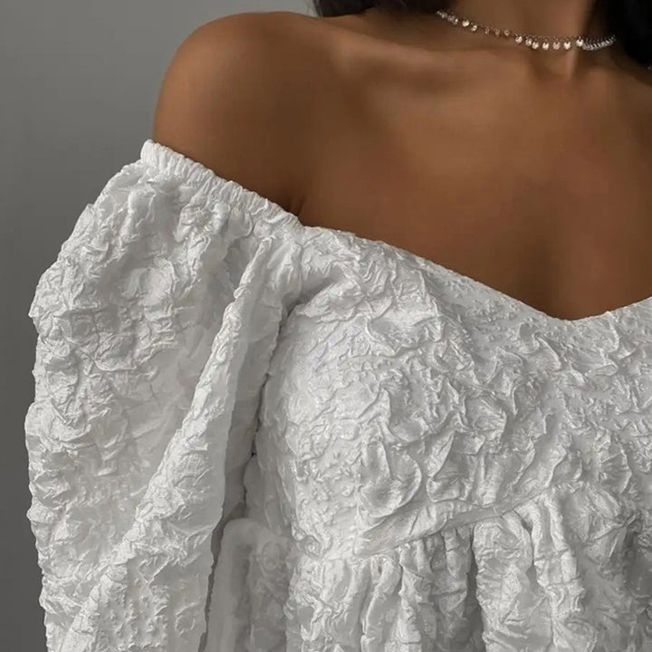 Dame Off-Shoulder Minikjole med voluminøse puffærmer og struktureret stof Stilla