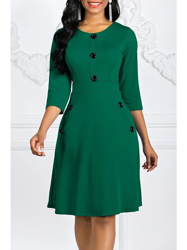 Dame elegant knælang kjole med dekorative knapper og 3/4 ærmer Stilla