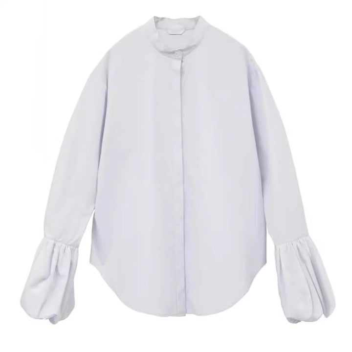 Damebluse med voluminøse ærmer og moderne ståkrave Stilla